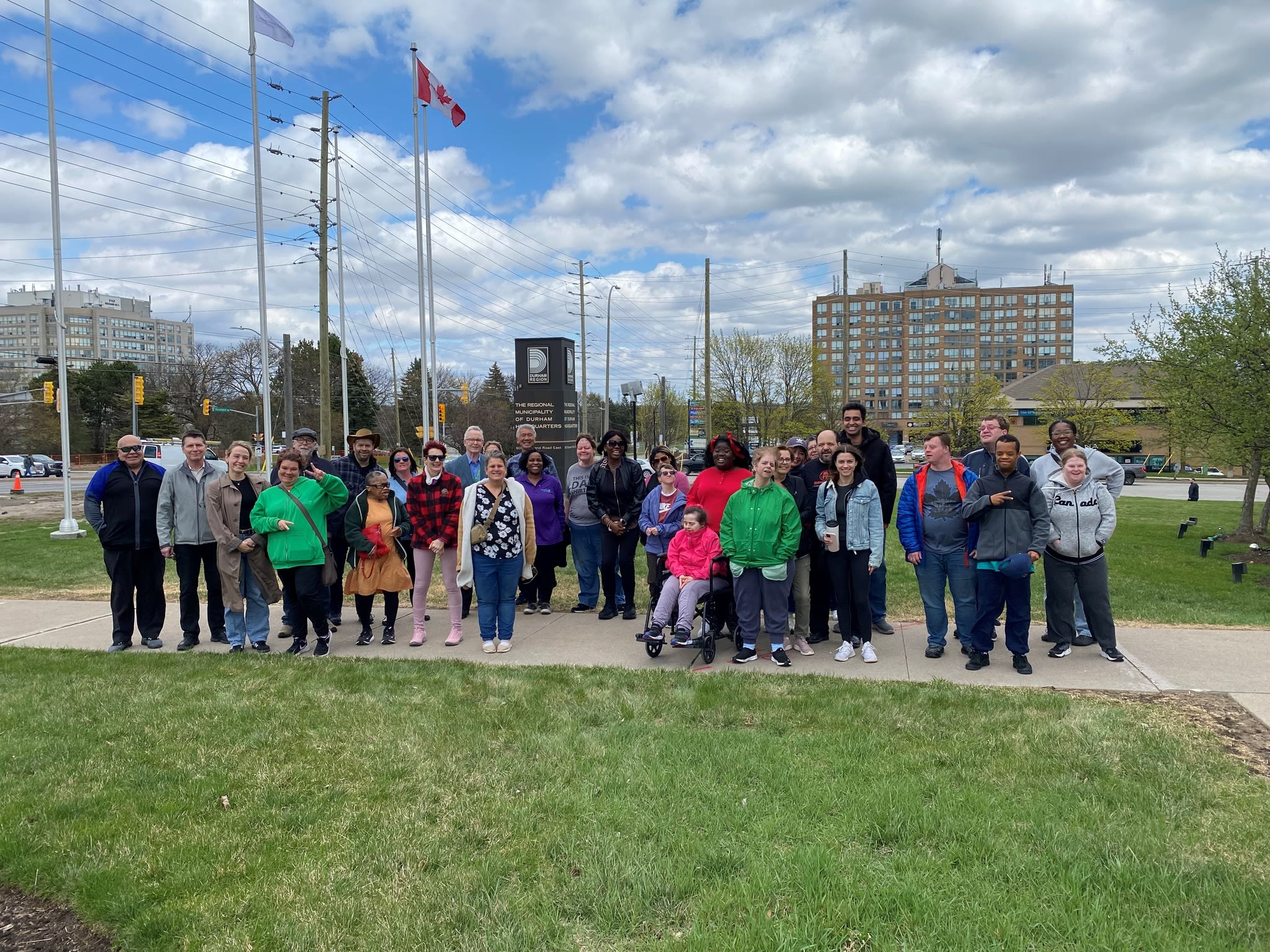 Group from CLAPW at Durham Regional HQ Flag Raising with Durham Regional Chair John Henry and Clarington Regional Councillor Willie Woo